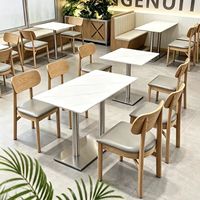 Ensemble de salle à manger commercial tropical moderne et écologique avec chaises en bois, plateau de table en pierre, structure métallique – Durable pour café et bar