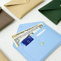 Porte-monnaie en cuir PU, élégant et portable, avec pince à billets, porte-documents, pochette multi-usages pour billets de voyage et rangement de passeport