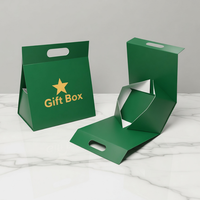 Boîte cadeau pliable portable noire de style tente avec poignée découpée, doublure en éponge et fermeture magnétique pour cosmétiques haut de gamme
