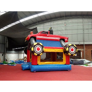 Château gonflable Monster Truck Rally avec roues jaunes vives et toboggan bleu pour les fêtes d'enfants en plein air et les divertissements en parc - Product Image 5