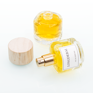 Nuevo Diseño 2025: Mini Botella de Perfume Redonda de Vidrio Transparente de 30 ml, Botella de Spray de Perfume Vacía con Tapa de Madera y Caja de Empaque - Product Image 4