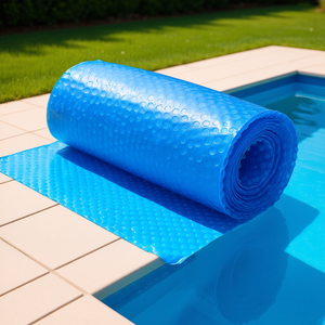 ผ้าคลุมสระว่ายน้ำสีน้ำเงิน ขนาด 28 x 14 ฟุต หนา 8 มิล รูปทรงสี่เหลี่ยมผืนผ้า สำหรับสระว่ายน้ำแบบฝังดิน เพื่อให้ความร้อนและประหยัดพลังงาน - Product Image 2