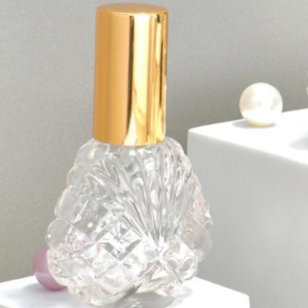 Clear Bottle with gold lids