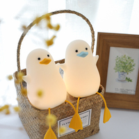 Produits les plus vendus 2025 Canard couché Lampe de chevet Rechargeable Mignon Bébé Veilleuse en silicone pour chambre d'enfants