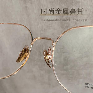 Gafas de titanio puro redondas para mujer Danyang 18002, montura ligera para miopía, lentes de plástico de marco completo - Product Image 1