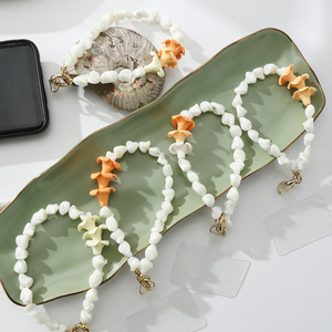 <span class=keywords><strong>สาย</strong></span>คล้องโทรศัพท์แบบไขว้ประดับเปลือกหอยรูปทรงแปลกตาพร้อมจี้ดอกไม้ดินเผา สไตล์ฮาวายสุดอินเทรนด์ - Product Image 3