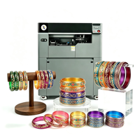 360 °   Machine d'impression UV à jet d'encre rotative avec CMYK W V pour bracelets en plastique, verre et autres produits cylindriques