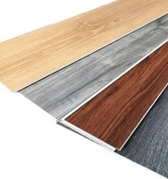 Revêtements de sol SPC modernes populaires multicolores gaufrés et imperméables, panneaux muraux en vinyle durables pour la décoration de studios et de salles d'étude