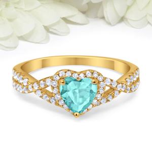 แหวนแต่งงาน/หมั้น ดีไซน์ใหม่ล่าสุด เงินแท้ S925 ประดับเพชร CZ ทรงกลม และพลอยพาราไบต์ทรงรี ดีไซน์เกลียว - Product Image 1