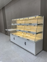 Vitrine de présentation en verre pour pâtisserie avec éclairage LED, design luxueux et écologique, emballée en carton pour l'affichage de gâteaux et desserts