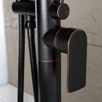 Robinet de baignoire moderne de luxe résistant aux éclaboussures, à poser au sol, avec corps en laiton et finition ORB pour salles de bain d'hôtels et résidentielles