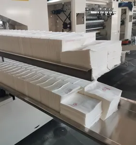 Machine automatique de fabrication de serviettes en papier de soie avec impression en quatre couleurs Ligne de production Machine de fabrication de serviettes en papier à gaufrer pliée