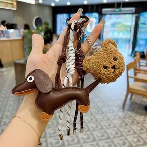 Hot Style Dachshund <b>Key</b> <b>Chain</b> Distinctive PU Leather Woven Rope Design Ins Style Puppy Hanging Ornaments with Bag Packaging - Product Image 1