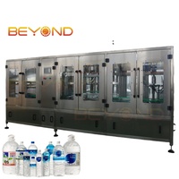 Machine de remplissage automatique de liquides linéaire électrique de 5 litres pour bouteilles PET de 5L à 10L dans la ligne de production chimique et de produits manufacturés