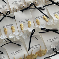 Pochettes à bijoux en gros en stock, best-seller Xiaohongshu, emballage pour boucles d'oreilles en perles, attache-cheveux en coton, minimaliste noir et blanc