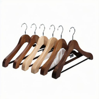 Service personnalisé vente en gros d'un cintre en bois de lotus de couleur naturelle de qualité