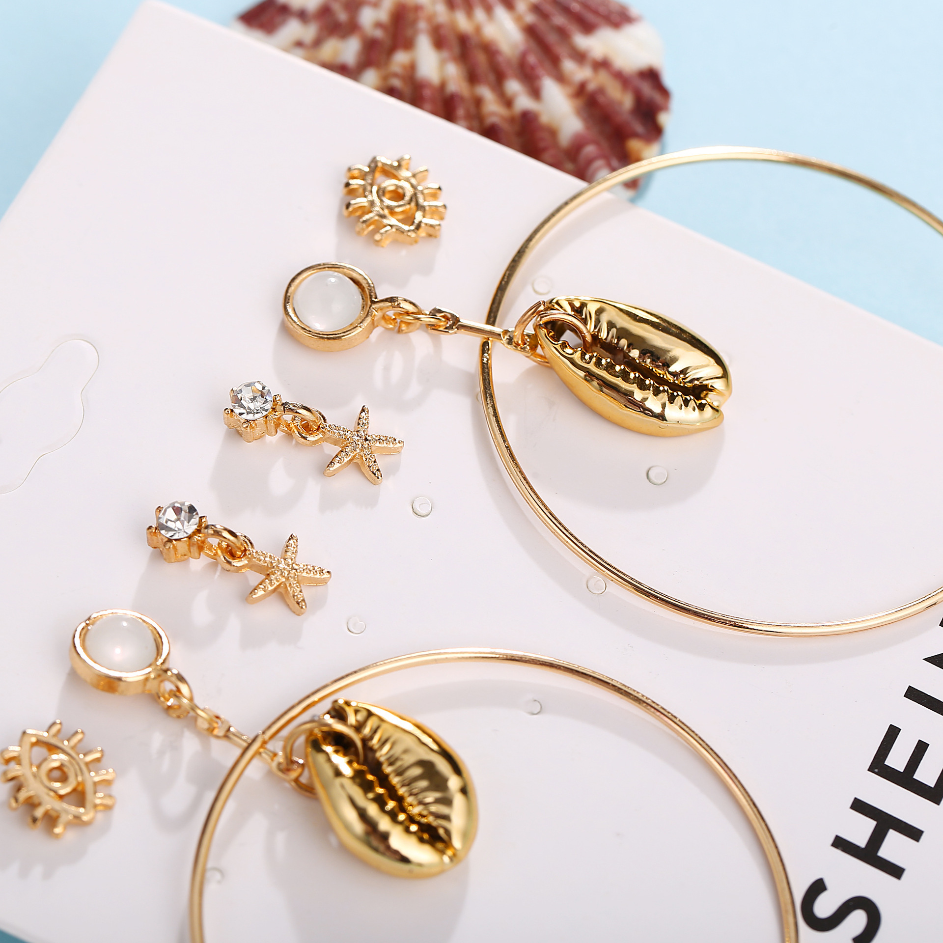 2019 yiwu hotsale mode 3 pièces océan étoile de mer oeil et morceaux de coquille ensembles boucles d'oreilles bijoux