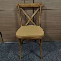 Chaise en résine PP à dossier croisé, élégante, durable, empilable, portable, imperméable, pour hôtel, salle de sport, mariage, vente en gros
