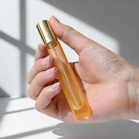 Flacon de parfum vide transparent brillant personnalisé de 10 ml avec bouchon cylindrique noir doré, mini flacon vaporisateur de parfum avec boîte d'emballage personnalisable