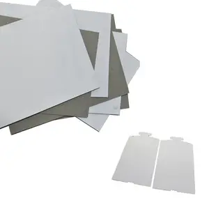 Склад бумаги, много листов, серый картон с ламинированной подкладкой