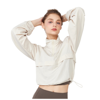 Veste coupe courte légère pour femme avec col montant et demi-zip, ourlet à cordon de serrage, manches longues, coupe-vent d'extérieur pour la randonnée et la course à pied