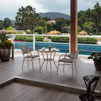 Ensemble de salle à manger d'extérieur moderne avec chaises en aluminium à structure en maille Textilene et table ronde en fer pour hôtel, patio, balcon, loisirs
