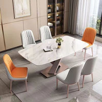 Ensemble de table à manger carrée de luxe dorée avec plateau en pierre frittée, design moderne, 6 places, durable et écologique, garantie 10 ans