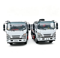 Camion à ordures compacteur Isuzu 4X2 à transmission manuelle, 10 mètres cubes, nouvelle énergie, chargement arrière, vente directe d'usine