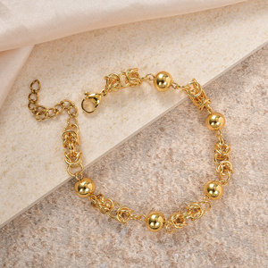Pulsera de pareja unisex de acero inoxidable con eslabones entrelazados de cuentas redondas lisas y pulidas de lujo, resistente al deslustre y a los arañazos, fabricada en China. - Product Image 5