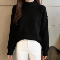 Pull en maille uni noir à col montant pour femme, avec épaules tombantes et manches longues à revers côtelés, coupe décontractée et décontracté