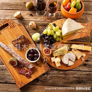 Tabla de cortar reversible de madera redonda con asa para cocina, comedor, preparación de frutas y verduras - Product Image 1