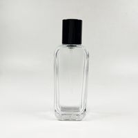 Flacon de parfum vide en verre transparent de 50 ml avec pulvérisateur et emballage personnalisé