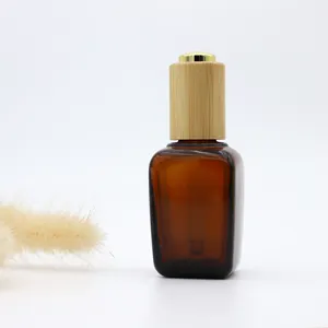 Botol tetes kaca Amber bening bentuk persegi, 30ml 50ml 100ml untuk minyak esensial dengan tutup kayu bambu