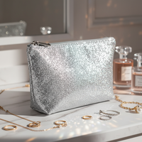 Pochette cosmétique argentée métallisée brillante avec surface pailletée, trousse de maquillage pour femmes, idéale pour les soirées