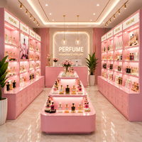 Vitrine de présentation de parfums personnalisée rose de luxe en bois et verre pour la conception de magasins de détail