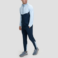 Ensemble De Survêtement Deux Pièces Léger en Polyester Personnalisé Coupe-Vent Color Block à Capuche pour Homme