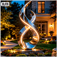 Sculpture d'art abstrait en acier inoxydable 304/316L BSA Modern Twisted Loop Mirror pour manoir, hôtel et cour