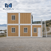 Maison conteneur pliable préfabriquée de haute qualité de 20 pieds avec un design contemporain, deux étages et une terrasse spacieuse