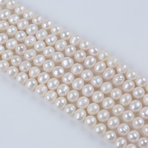 ไข่มุกน้ำจืดสีขาวขนาด 10-11 มม. ของ Zhuji Wholesale แสงเงาสวยงาม ทรงมันฝรั่ง ผลิตภัณฑ์กึ่งสำเร็จรูปสำหรับงาน DIY - Product Image 1