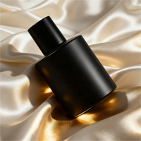 Flacons de parfum opaques les plus vendus 50ml 30ml Bouteille en verre rond noir mat avec couvercle cylindrique