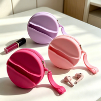 Pochette cosmétique ronde en silicone avec dragonne, fermeture éclair, étui de rangement portable pour rouges à lèvres et brillants à lèvres, organiseur d'écouteurs