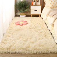 Vente en gros de tapis moderne en polyester rose moelleux avec cheveux super longs fabriqués à la machine, de couleur unie et hirsute, pour le salon de l'enfant