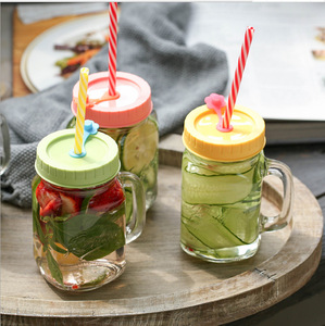 Cốc thủy tinh trong suốt với xử lý 480ml sáng tạo sippy Son cup hộ gia đình 16 oz 500ml Emboss Mason Jar với nắp và rơm - Product Image 1