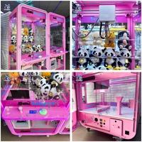 En gros, Machine à griffes à monnayeur Naughty Dog pour jeux d'enfants, avec jouets en peluche et poupées, rose transparente, pour arcade, 110V/220V, Version anglaise pour magasins