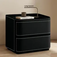 Table de chevet moderne de luxe léger au design créatif pour chambre à coucher