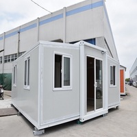 Promotion : Maison conteneur modulaire extensible Allstar en acier, design moderne et luxueux, avec porte, panneaux sandwich, carport inclus, garantie 5 ans, couleur verte.
