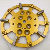 Disque abrasif diamanté PCD de 10 pouces (250 mm) haute dureté pour l'élimination de la résine époxy et des revêtements anciens sur sols en béton - Vente en gros usine
