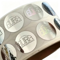 Etiqueta autoadhesiva en rollo con estampado en caliente personalizado en oro y plata, resistente al agua, con logotipo en relieve para empaques de botellas de cosméticos