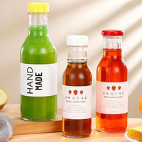 Botella de vidrio transparente Oshow de 8oz/12oz (500ml) con cuello de rosca continua 38-400 y tapa metálica con precinto de seguridad para salsa o agua
