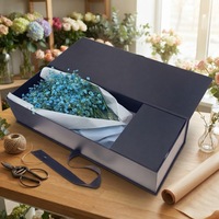 Boîte à fleurs élégante en forme de livre, en matériaux recyclés, avec ruban noir gaufré, pelliculage mat UV, insert en papier premium